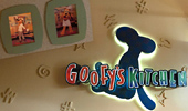 Find framed photos of Goofy, Chip and Pluto in the entrance to the restaurant.
