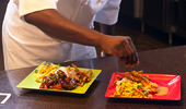 Chefs at Tangaroa Terrace add the finishing touches to a dish.