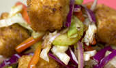 Close up of chicken bits and salad