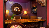 Wet bar, decorated with Asian and Indian influences.
