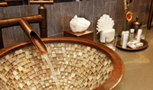 Water-well themed sink fixtures.