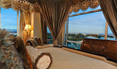 Point of view through the windows from the bed pillows.