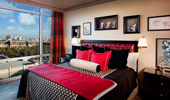 King-size bed, surroundings and panoramic view from the windows.