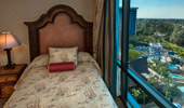 Beds near a large window with a post-card view.