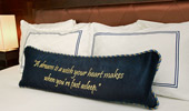 Throw pillow stitched with this saying, 
