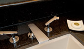 Faucet fixtures in the shape of a famous mouse