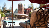 Point of view of the water slide from a lounge chair.