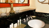 Wash basin with pampering Guest-size soaps, lotions and products
