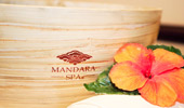 A bowl printed with the Mandara Spa logo