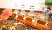 Bottles of massage oils with labels like 