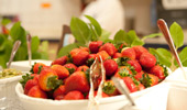 A large dish of strawberries