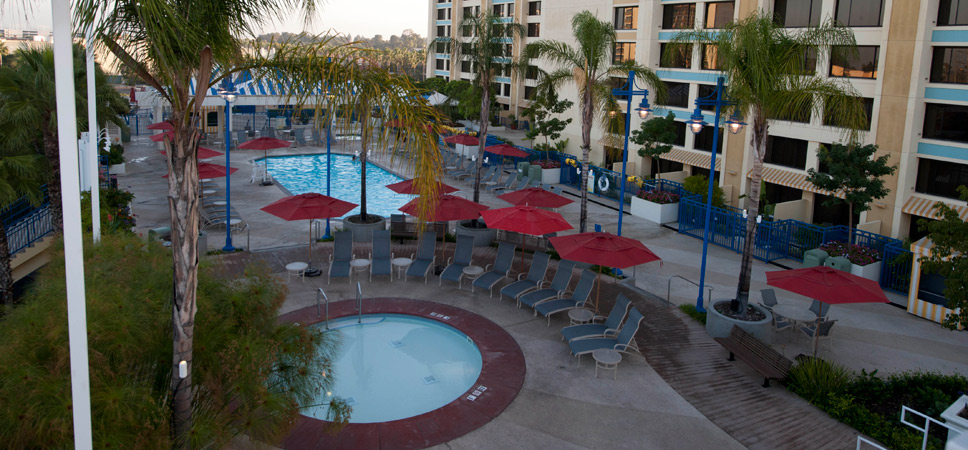 An inviting scene: the pool and spa are surrounded by lounge chairs.